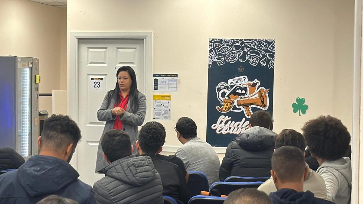 Gislene Silva, founder of Cork Staff Solutions, speaking to a group of candidates